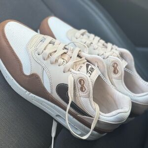 Nike White and Brown Athletic Sneakers with Lace-Up Design